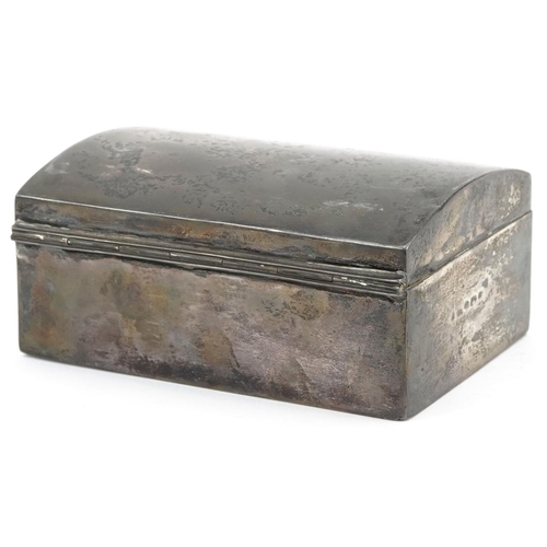 662 - A rectangular silver dome topped cigar box with hinged lid, indistinct hallmarks, 5.5cm H x 12.5cm W... 