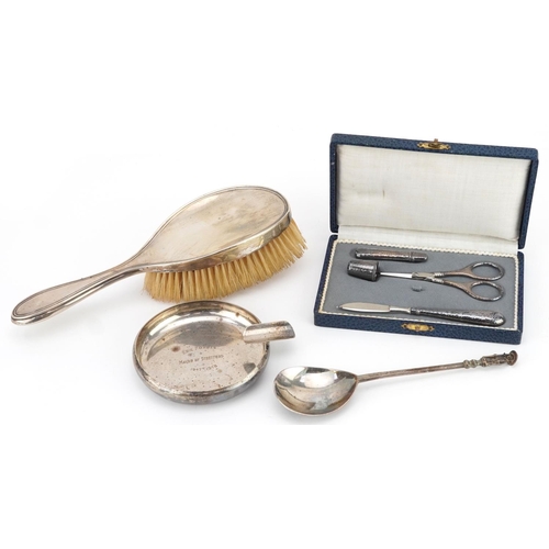 703 - Antique and later silver items including an apostle spoon, ashtray, silver backed clothes brush and ... 