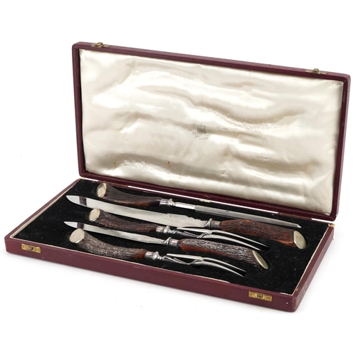 714 - Asprey & Co, a five piece carving set with horn handles housed in a velvet and silk lined fitted cas... 