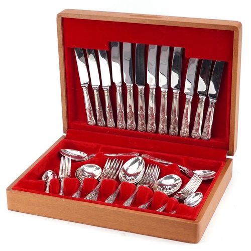 713 - A teak six place canteen of Viners Sheffield silver plated cutlery, the canteen 39cm wide.