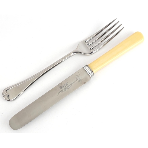 711 - An oak six place canteen of Dixon stainless steel cutlery