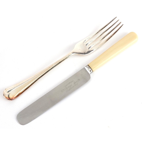  An Art Deco canteen of silver plated and stainless steel cutlery, the knives with ivorine handles, t... 