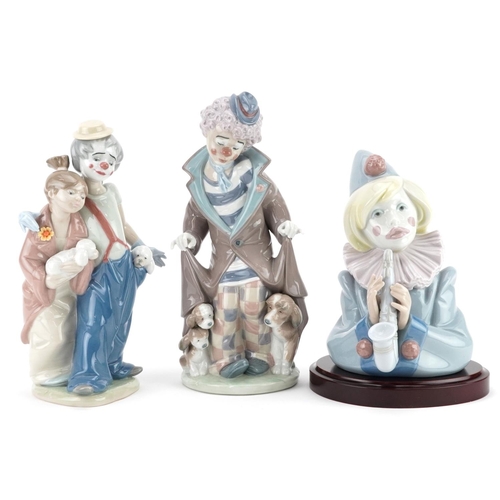 738 - Three Lladro figures - Surprise 5901, Saxophone Sad Note 5586 and Pals Forever 7686, the largest 25c... 