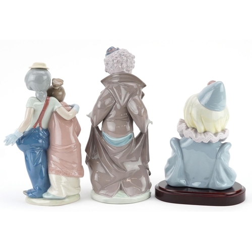 738 - Three Lladro figures - Surprise 5901, Saxophone Sad Note 5586 and Pals Forever 7686, the largest 25c... 