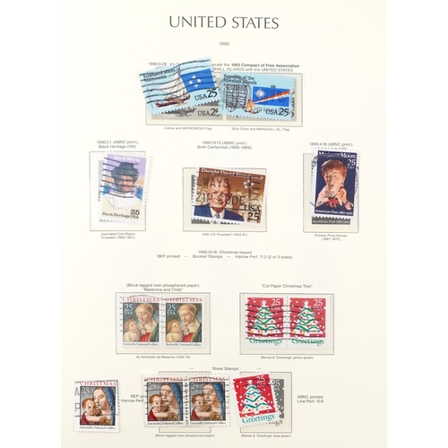 1529 - Four stamps albums containing mint American examples, mainly 20th century, including commemorative i... 