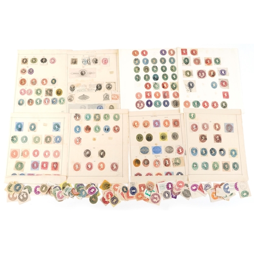 1545 - A quantity of USA 19th century and later postal stationery stamps, some mounted on sheets, including... 