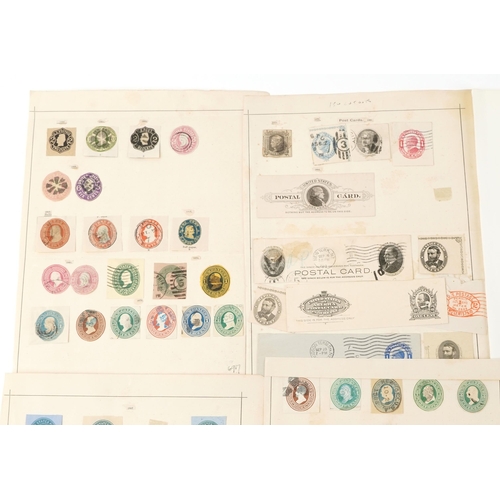 1545 - A quantity of USA 19th century and later postal stationery stamps, some mounted on sheets, including... 