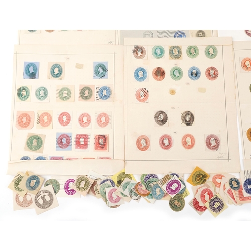 1545 - A quantity of USA 19th century and later postal stationery stamps, some mounted on sheets, including... 