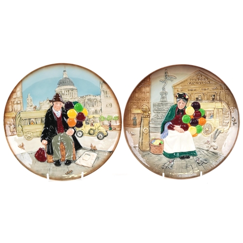 407 - Two Royal Doulton 'The Old Balloon Seller' plates, 26cm in diameter.