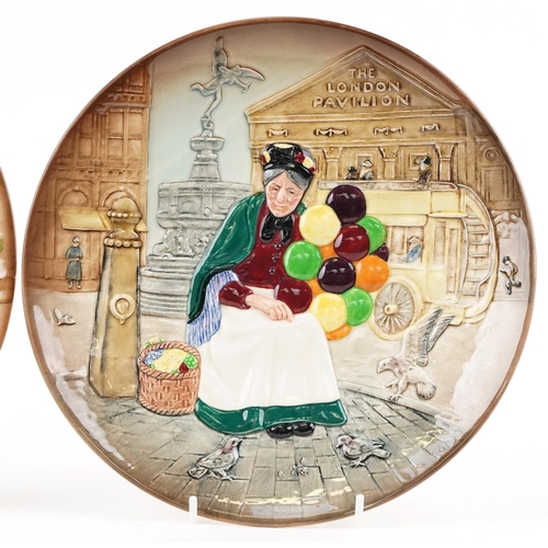 407 - Two Royal Doulton 'The Old Balloon Seller' plates, 26cm in diameter.