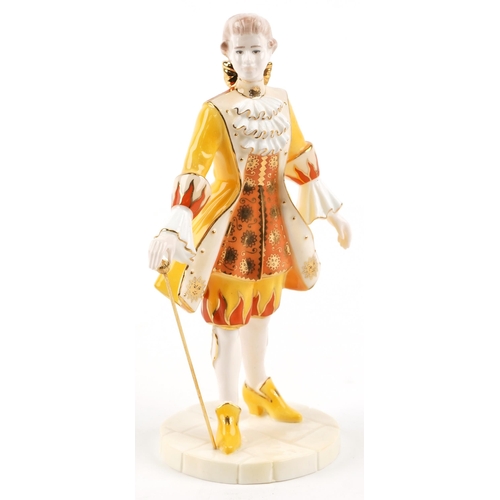 411 - A Coalport 'The Millennium Ball' bone china figure, number 1069/2500, modelled by Jack Glynn, 26cm h... 