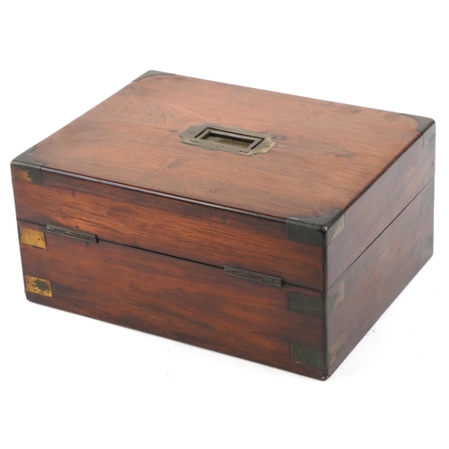 20 - A George III rosewood and brass bound jewellery box, the hinged lid revealing a fitted interior, 30c... 