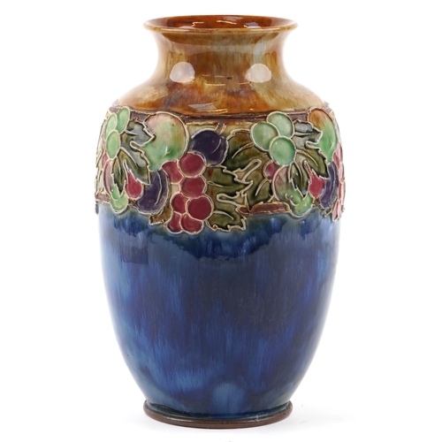 185 - A Royal Doulton Art Nouveau stoneware vase decorated with flowers, 34cm high.