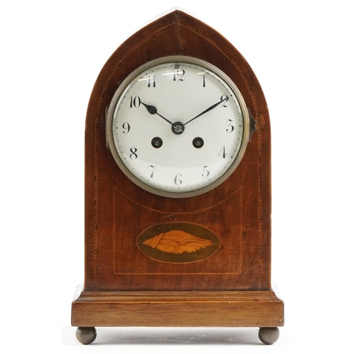 334 - An Edwardian mahogany cased mantle clock with circular enamelled dial, on brass ball feet, 30cm H x ... 