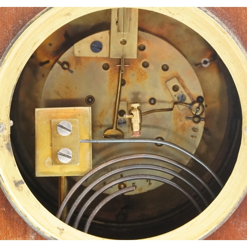 334 - An Edwardian mahogany cased mantle clock with circular enamelled dial, on brass ball feet, 30cm H x ... 