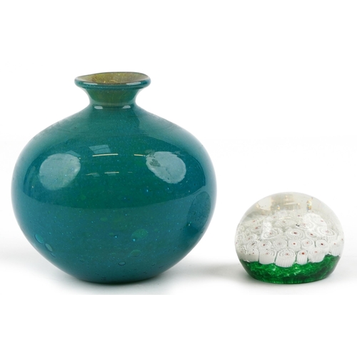 1322 - A Mdina green glass squat vase, 14cm high, together with a Murano millefiori paperweight, 8cm in dia... 