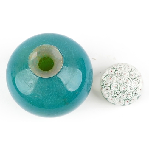 1322 - A Mdina green glass squat vase, 14cm high, together with a Murano millefiori paperweight, 8cm in dia... 