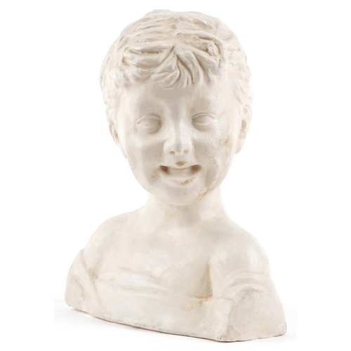 120 - A 20th century plaster head and shoulders bust of a young boy, 30cm high.