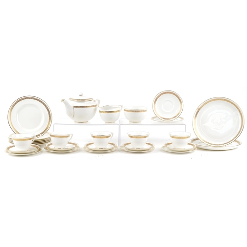 415 - A Royal Worcester fine bone china Golden Anniversary part tea set.