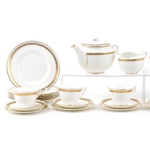 415 - A Royal Worcester fine bone china Golden Anniversary part tea set.