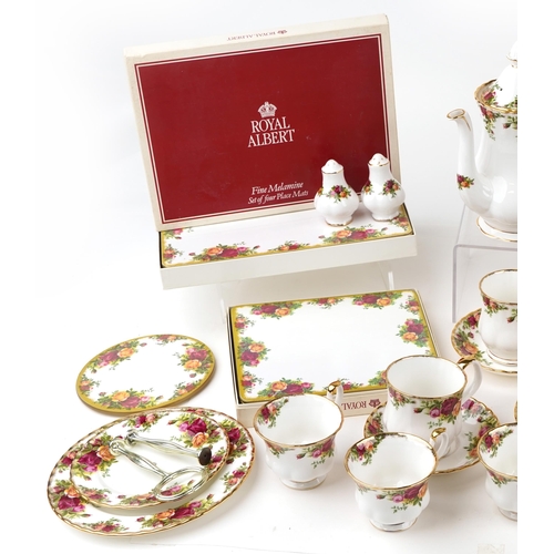 450 - A Royal Albert Old Country Roses dinner and tea service including a coffee pot and a cake stand.