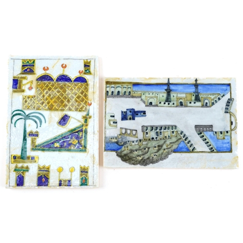 273 - A pair of Islamic Turkish Ottoman tiles hand painted with temples, each 24cm x 16.5cm.