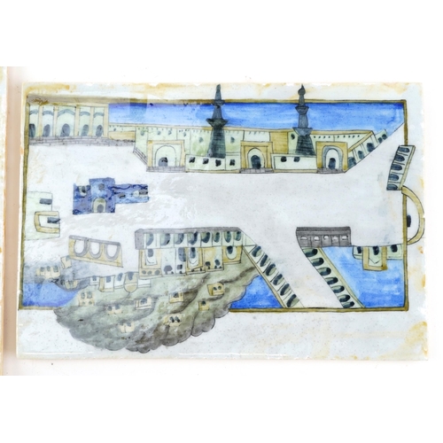 273 - A pair of Islamic Turkish Ottoman tiles hand painted with temples, each 24cm x 16.5cm.