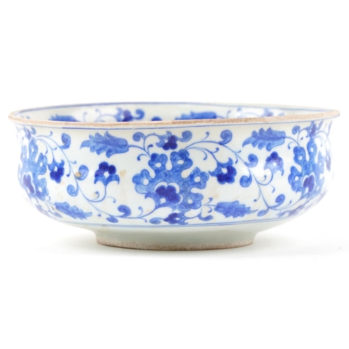 268 - A Turkish Ottoman bowl hand painted with stylized flowers, 21.5cm in diameter.