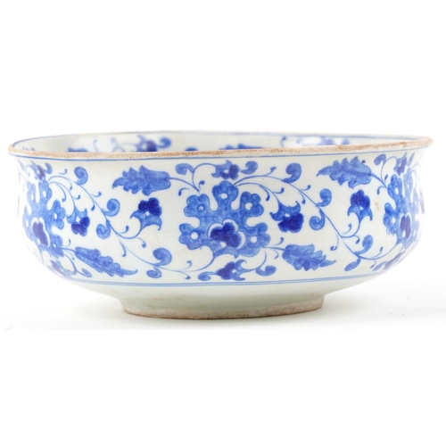 268 - A Turkish Ottoman bowl hand painted with stylized flowers, 21.5cm in diameter.