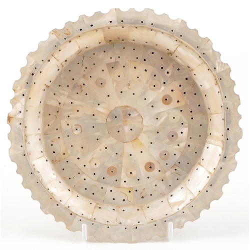 171 - An Indian Goan mother-of-pearl plate, 22cm in diameter.