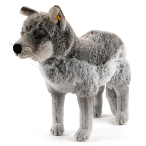 540 - A large Steiff stuffed wolf toy, 67cm in length.