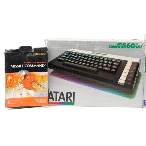 519 - An Atari computer 600XL with accessories including the Atari 1010 programme recorder and the Atari t... 