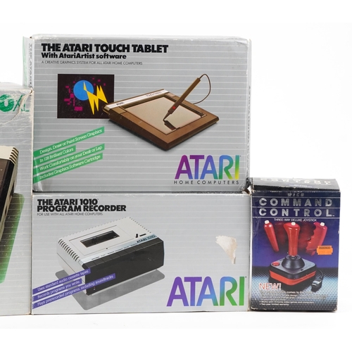 519 - An Atari computer 600XL with accessories including the Atari 1010 programme recorder and the Atari t... 