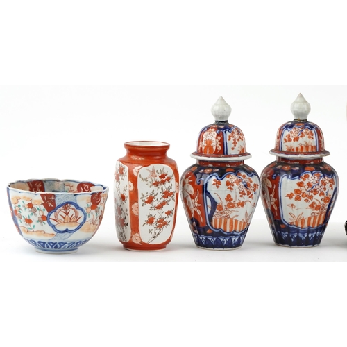 328 - A mixed group of Chinese and Japanese porcelain items including a pair of vases and covers, a gradua... 