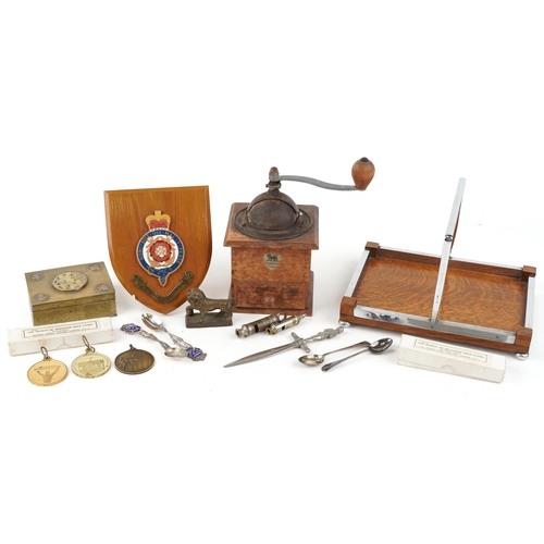 1226 - A small group of collector's items to include two Society of Miniature Rifle Club silver spoons sets... 