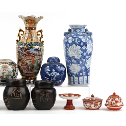 1216 - Chinese and Japanese ceramics including blue and white transfer printed vases, a pair of stoneware g... 