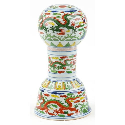 250 - A 20th century Chinese porcelain hat stand hand painted with dragons chasing flaming pearls amongst ... 