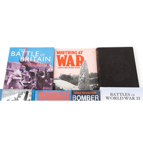 726 - A collection of military interest books including Battles of World War II, Massacre at Tobruk, Coast... 