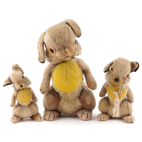 542 - Three Merrythought bunnies with jointed limbs including one musical example, the largest 56cm high.