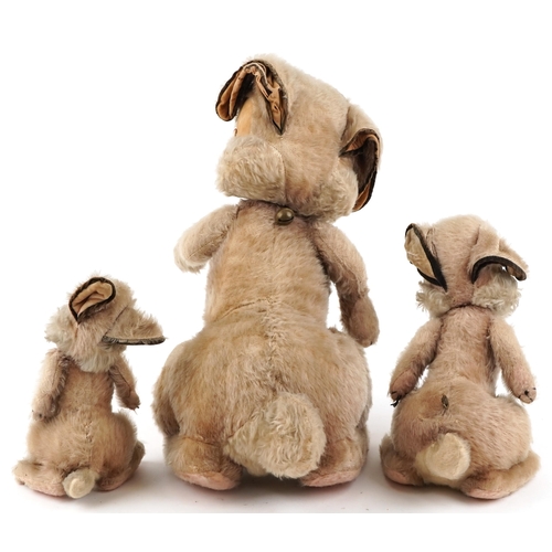 542 - Three Merrythought bunnies with jointed limbs including one musical example, the largest 56cm high.