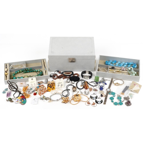 633 - Vintage and later jewellery and wristwatches, some silver, including earrings, polished stone neckla... 