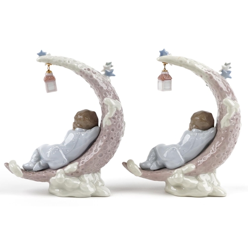 740 - Two Lladro figures of sleeping children on the moon - Heavenly Slumber each numbered 6479, each 17.5... 