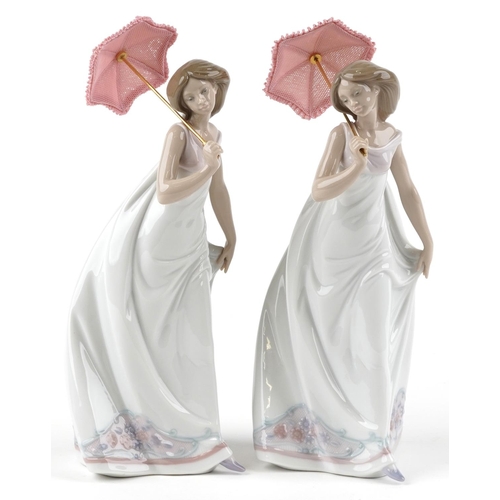 760 - Two Lladro figures of a lady holding an umbrella - Afternoon Promenade, each numbered 7636, each 28c... 