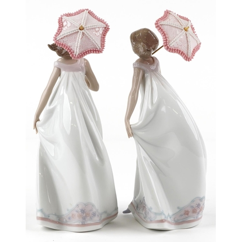 760 - Two Lladro figures of a lady holding an umbrella - Afternoon Promenade, each numbered 7636, each 28c... 