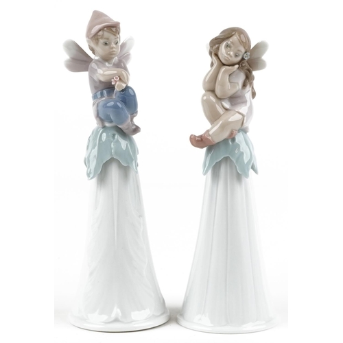 753 - Two Lladro bells in the form of fairies - It's a Girl!, It's a Boy,the largest 19.5cm high, with box... 