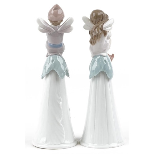 753 - Two Lladro bells in the form of fairies - It's a Girl!, It's a Boy,the largest 19.5cm high, with box... 