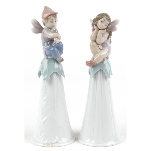 765 - Two Lladro bells in the form of fairies - It's a Girl!, It's a Boy,the largest 19.5cm high, with box... 