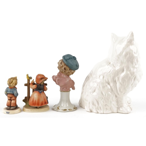 430 - A Royal Doulton pottery cat, 21cm high, together with two Goebel figures and a Capodimonte figure.