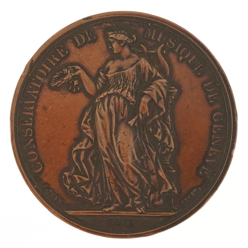 1457 - A large bronze 19th century musical medal awarded to Ethel M. Ivimy, 1892, 52.5mm in diameter.