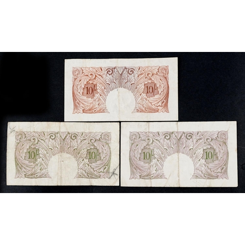 1504 - A Peppiatt Bank of England brown 1940s ten shilling note, serial number B76006530 and two mauve Pepp... 